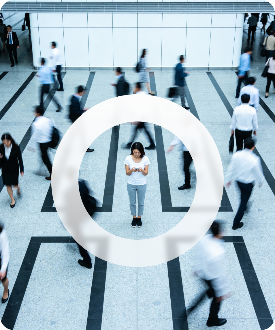 Person standing still in a crowd